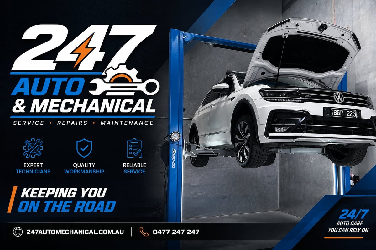 24/7 Auto & Mechanical logo and white Volkswagen car on hydraulic lift with service details and contact information